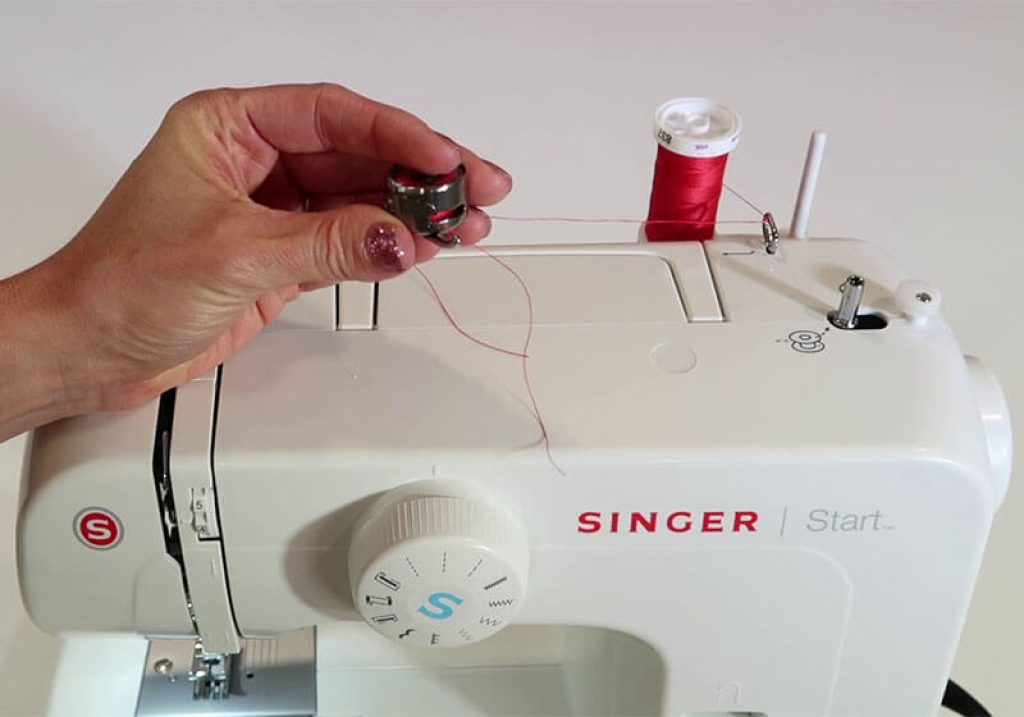 how to remove bobbin thread from sewing machine